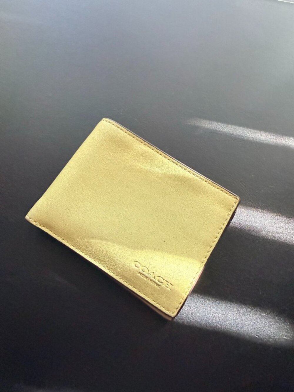 Coach Pale Yellow Leather Slim Bifold Wallet
